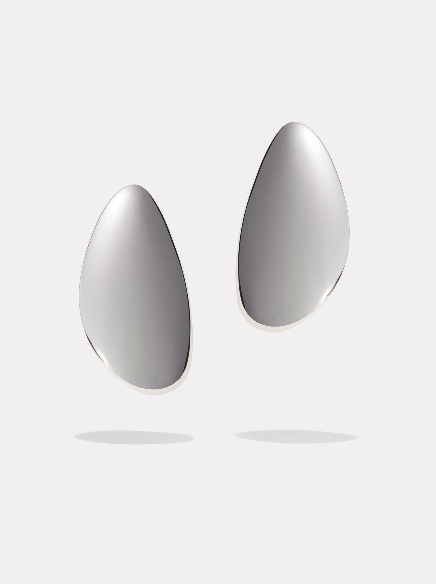 By Pariah organically seed shaped sterling silver earrings.